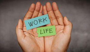 Work Life Balance Conceptual Photo, Hand Holding Text of Work and Life