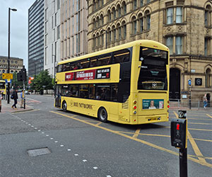 Photo from the TfGM site visit showing bee network on a bus out on the public streets